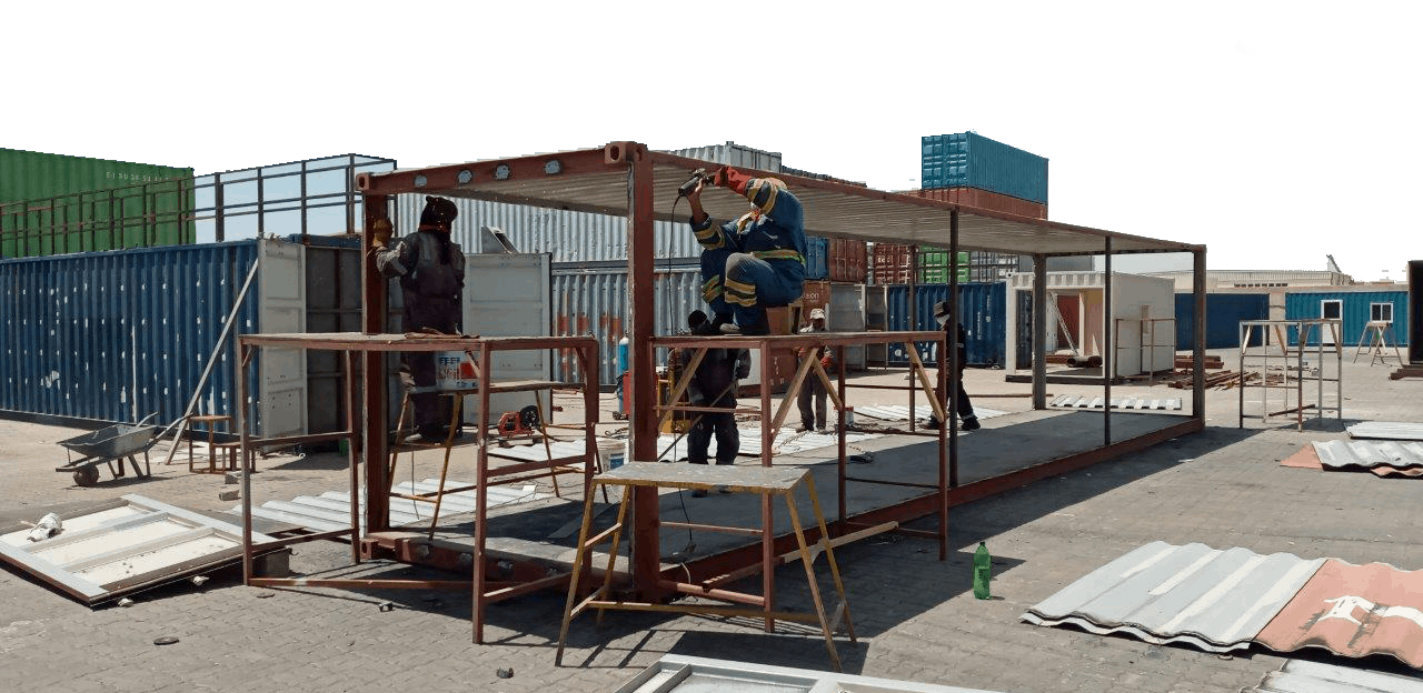 People working on container repair in Dubai