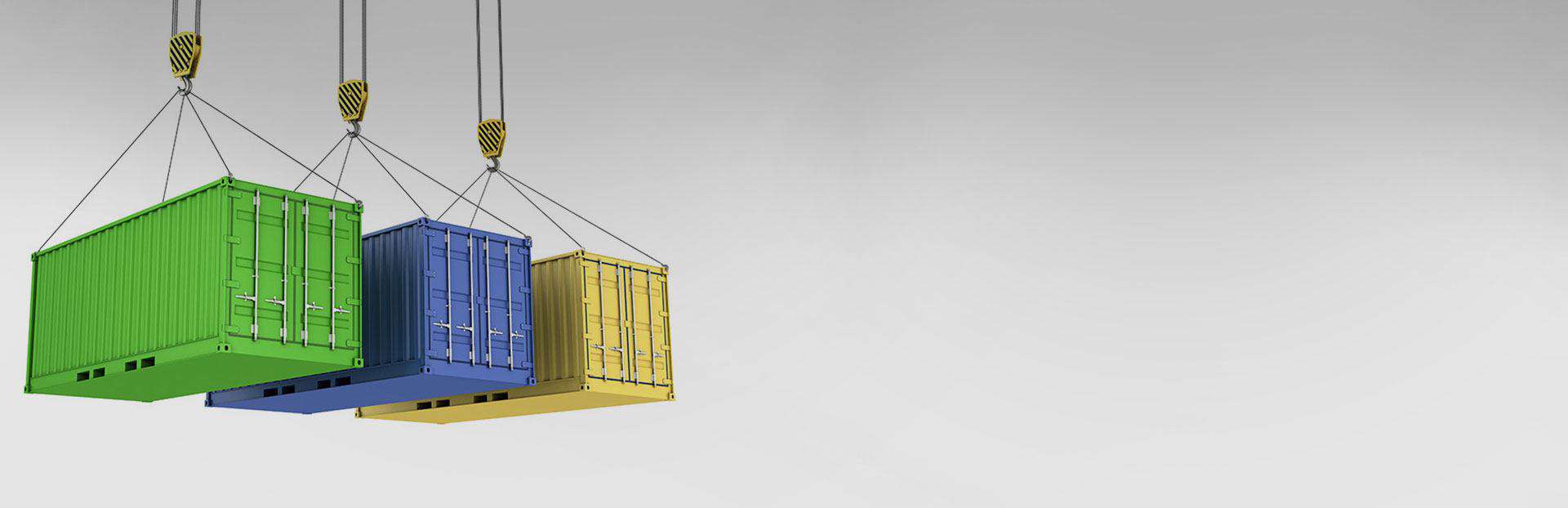 close of three shipping containers lifted by crane
